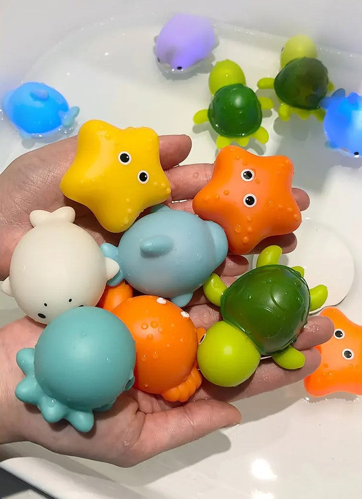 Jouets aquatiques colorés pour chien flottant sur l'eau